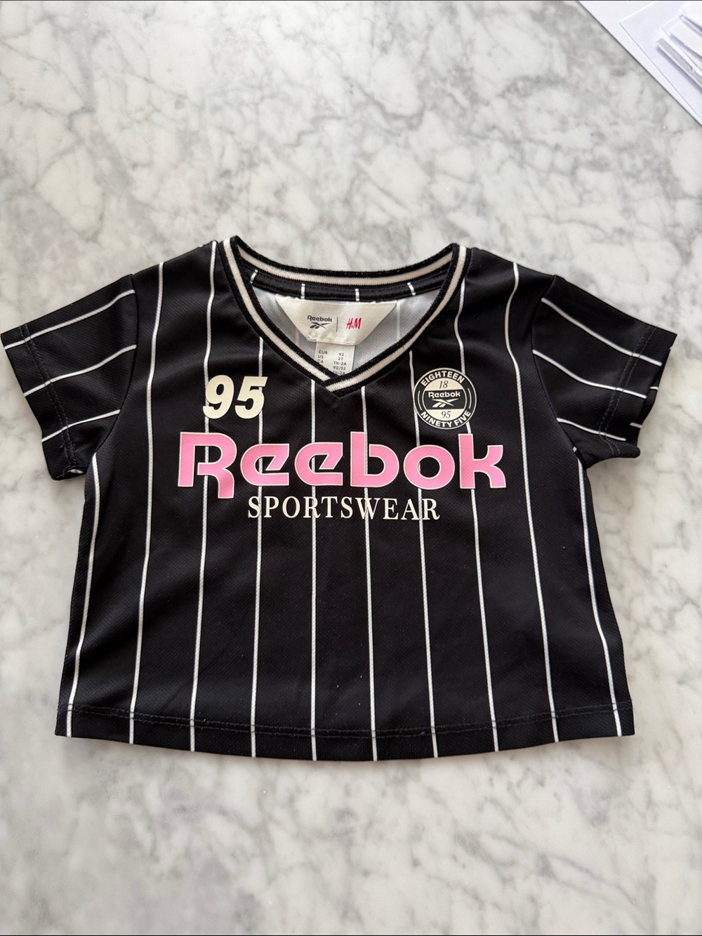 H&M Reebok Black Pinstripe Short-Sleeve Tee with Pink Logo